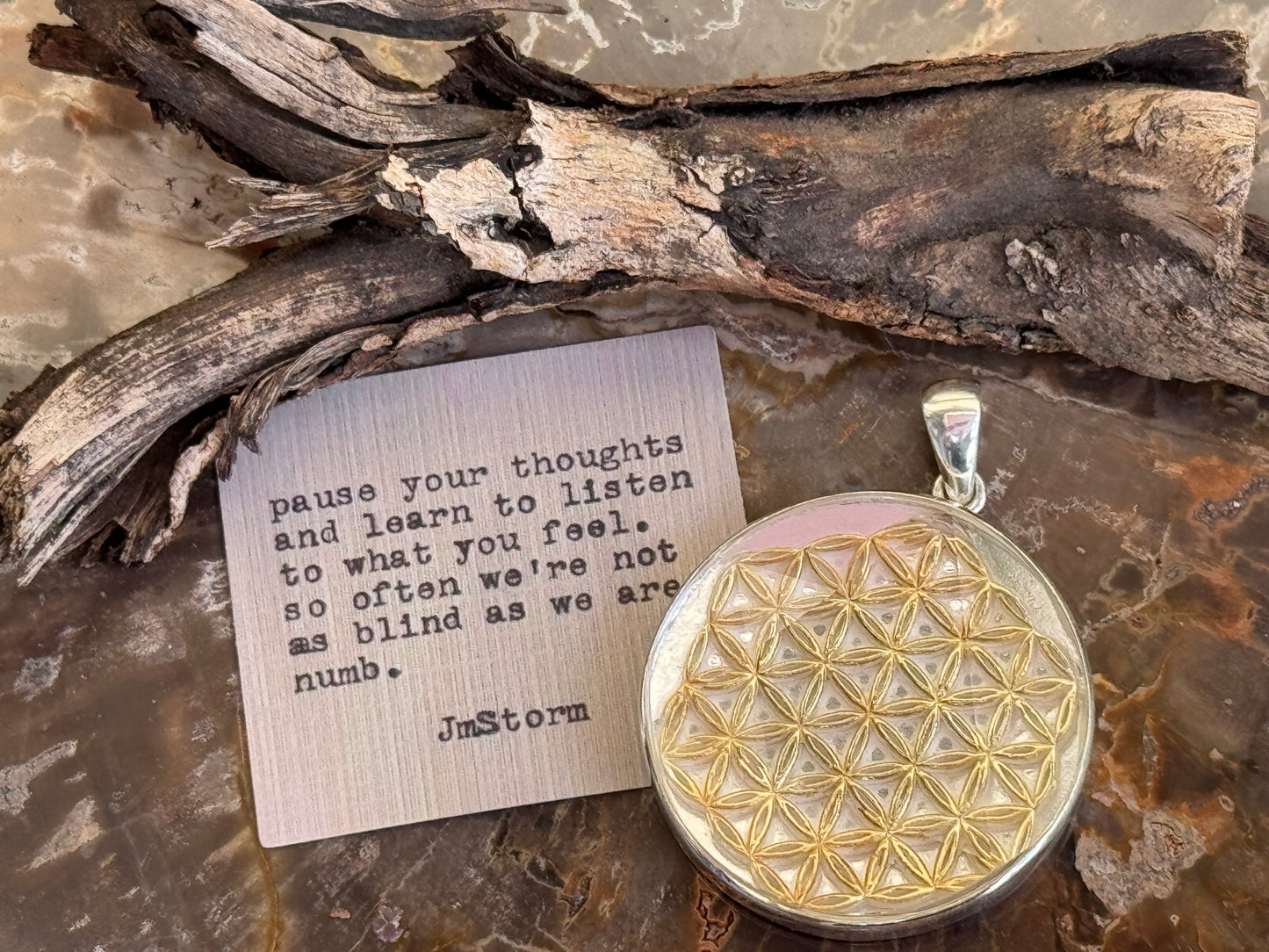 Golden Flower of Life Charm with High-Frequency Cut Quartz